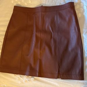 Maroon/ dark brown faux leather A-Line mini skirt.